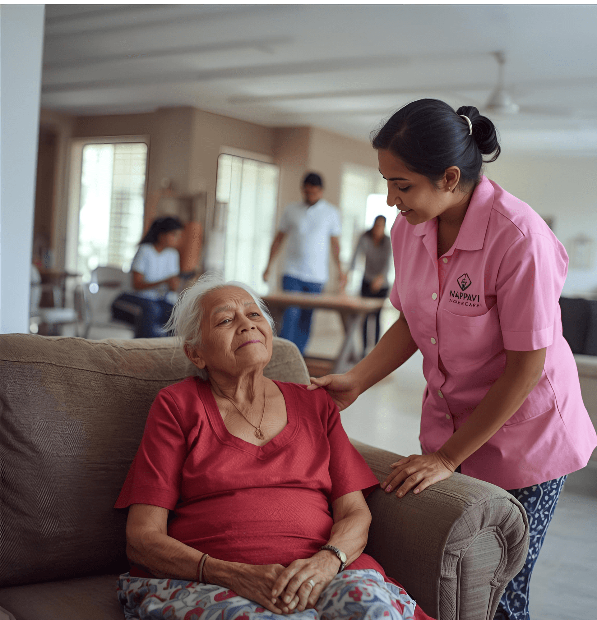 Professional nurse assisting an elderly patient at home